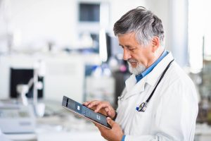 doctor with surface tablet