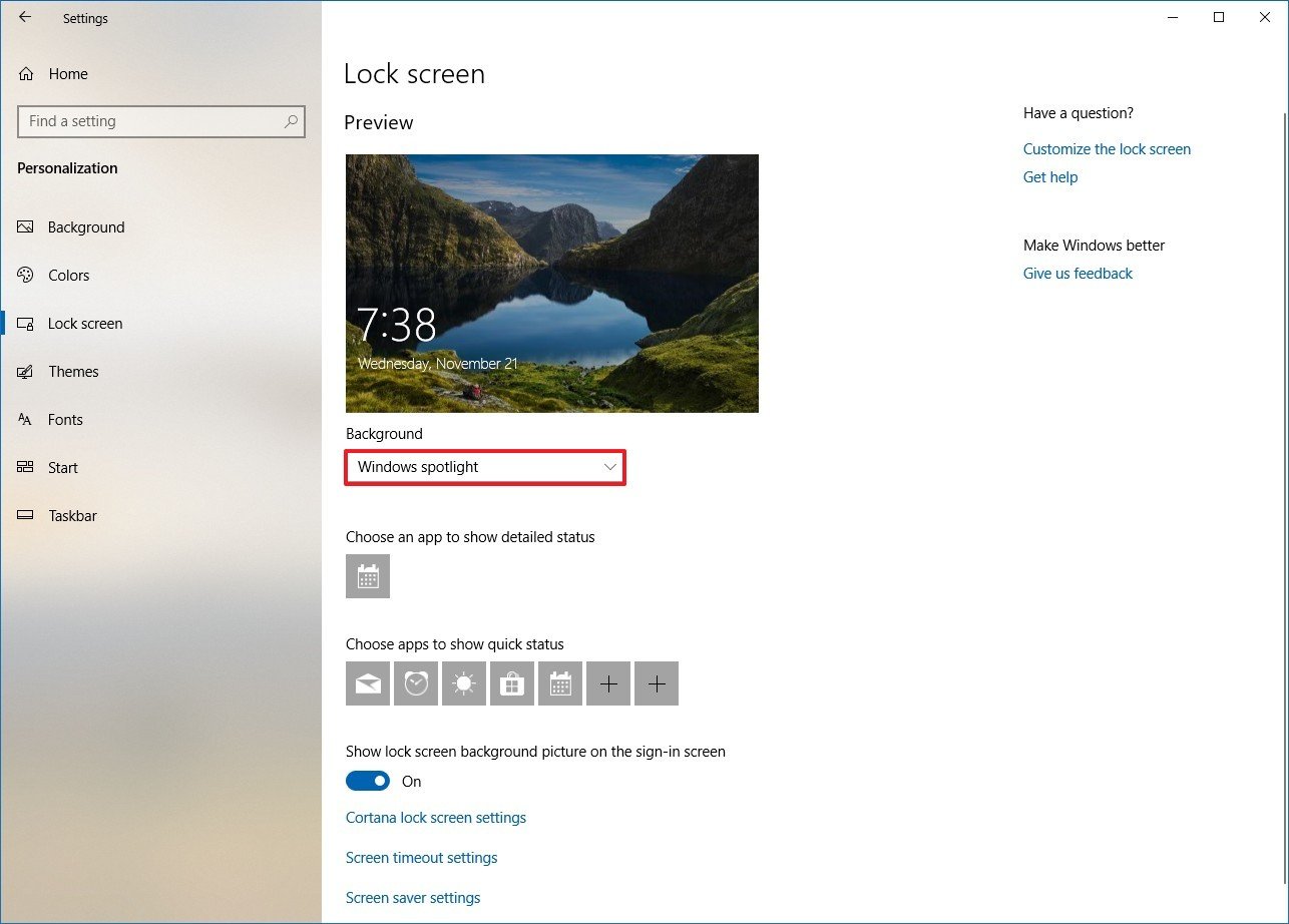 Windows Lock screen settings, showing the "Background" option set to "Windows spotlight"